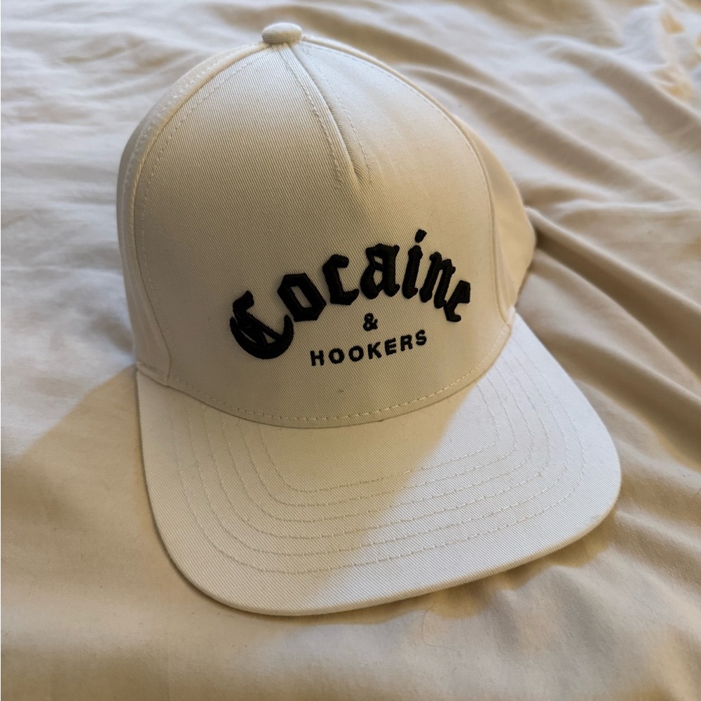 White Cap with Black Text